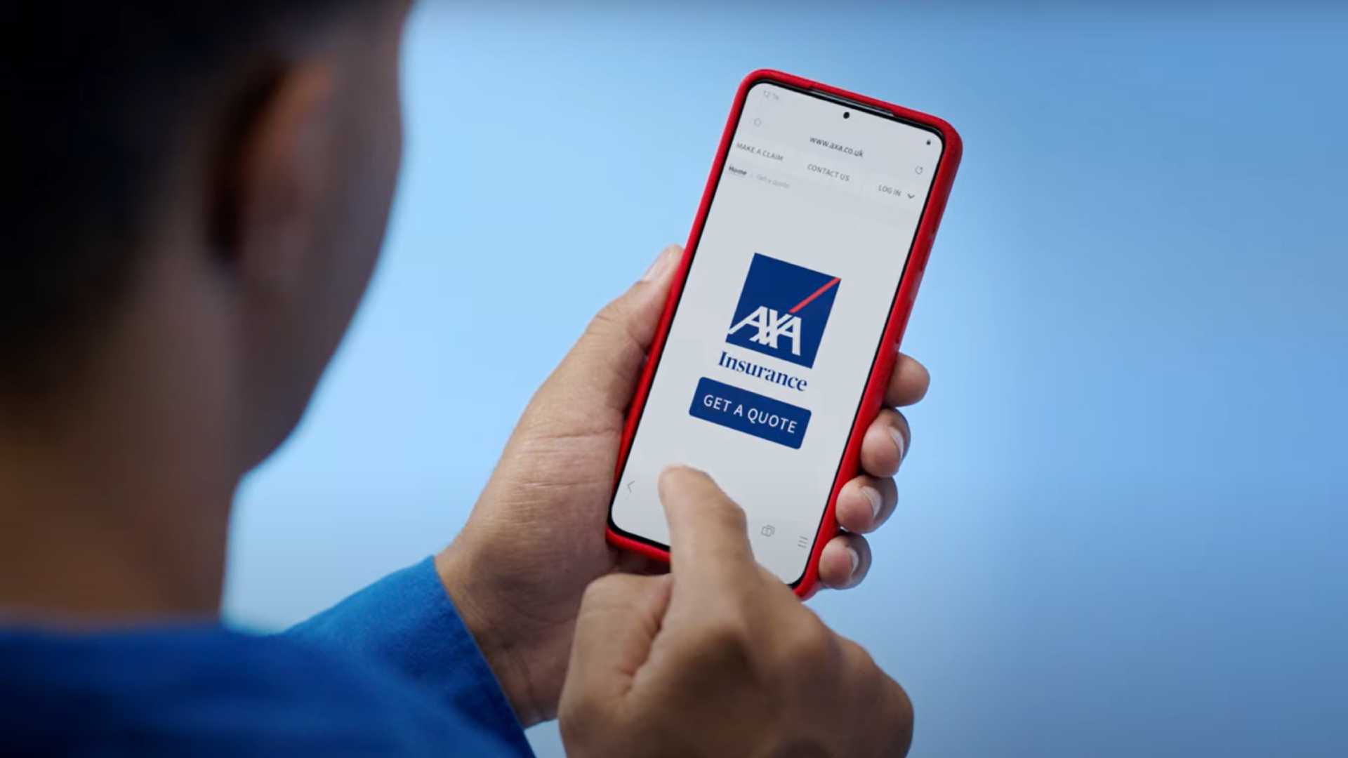 Man holding his smartphone about to start a quote on screen with AXA