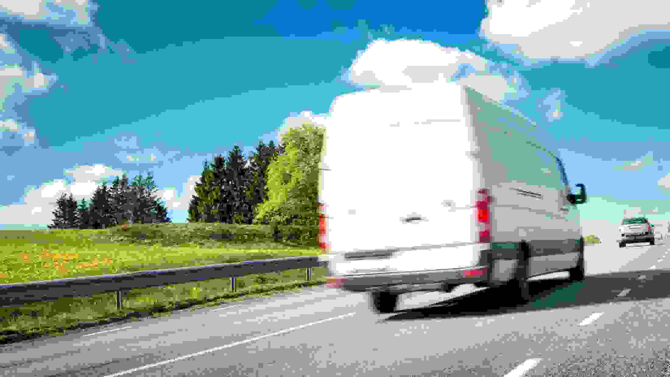 White van on road