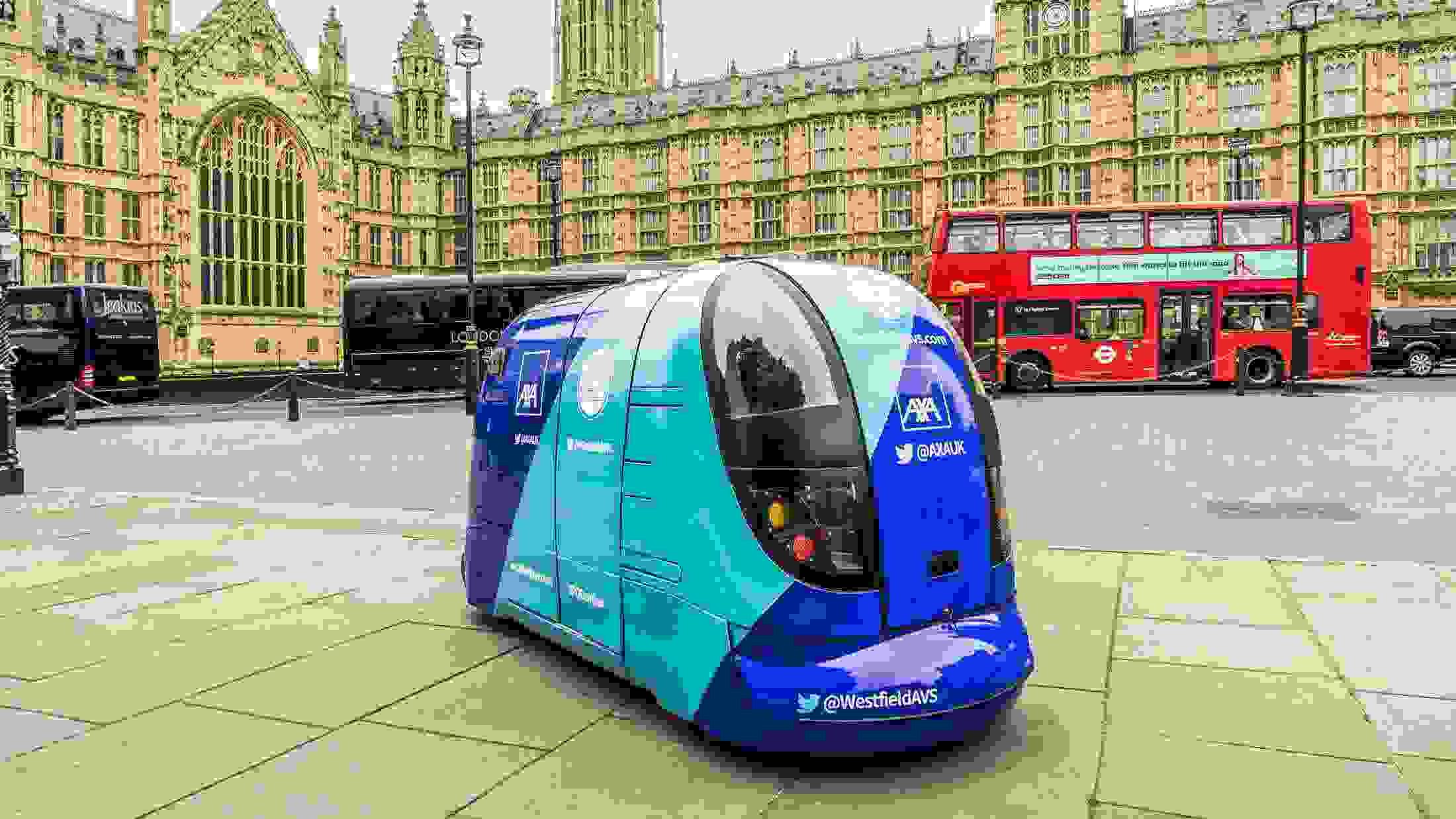 Driverless car outside Houses of Parliament