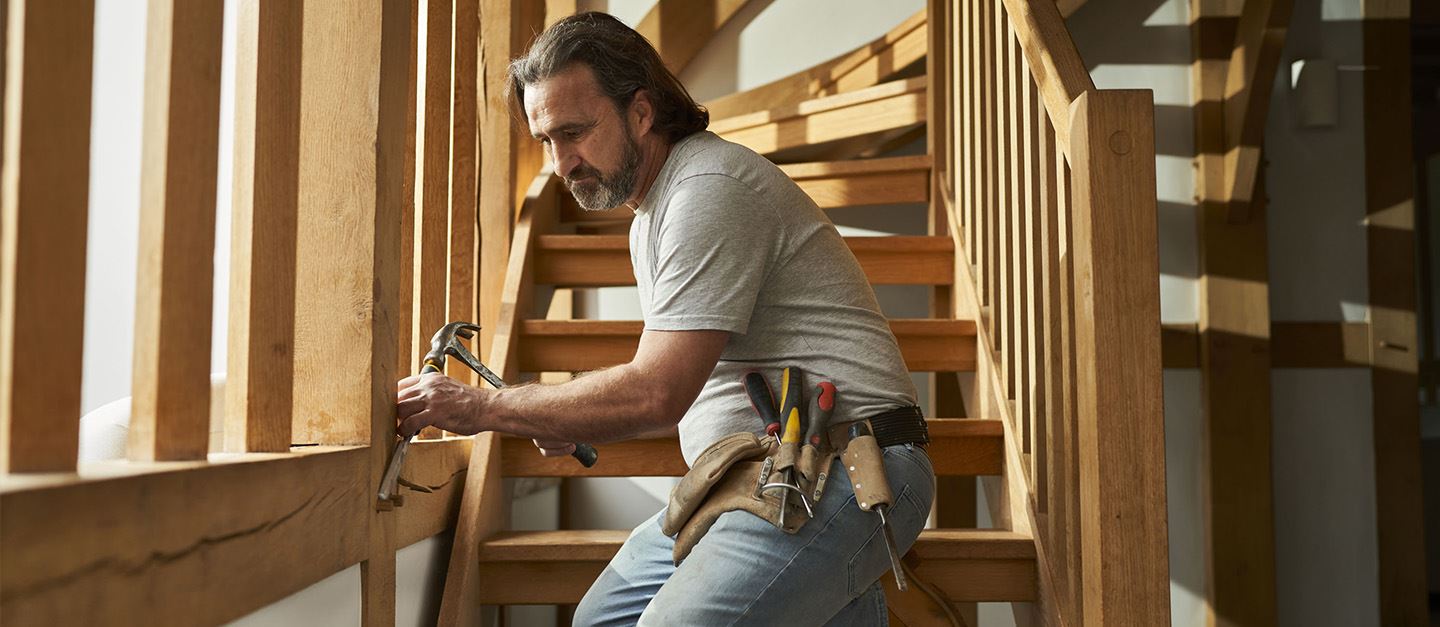 Tradesman and AXA Customer, Steve Follard, completing woodwork
