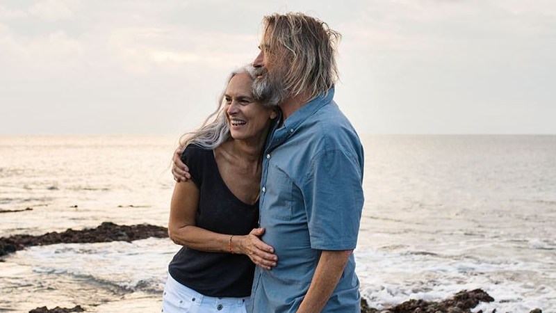 Man and woman hugging on beach