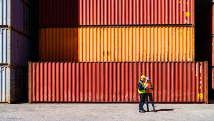 Shipping containers stacked on top of one another.