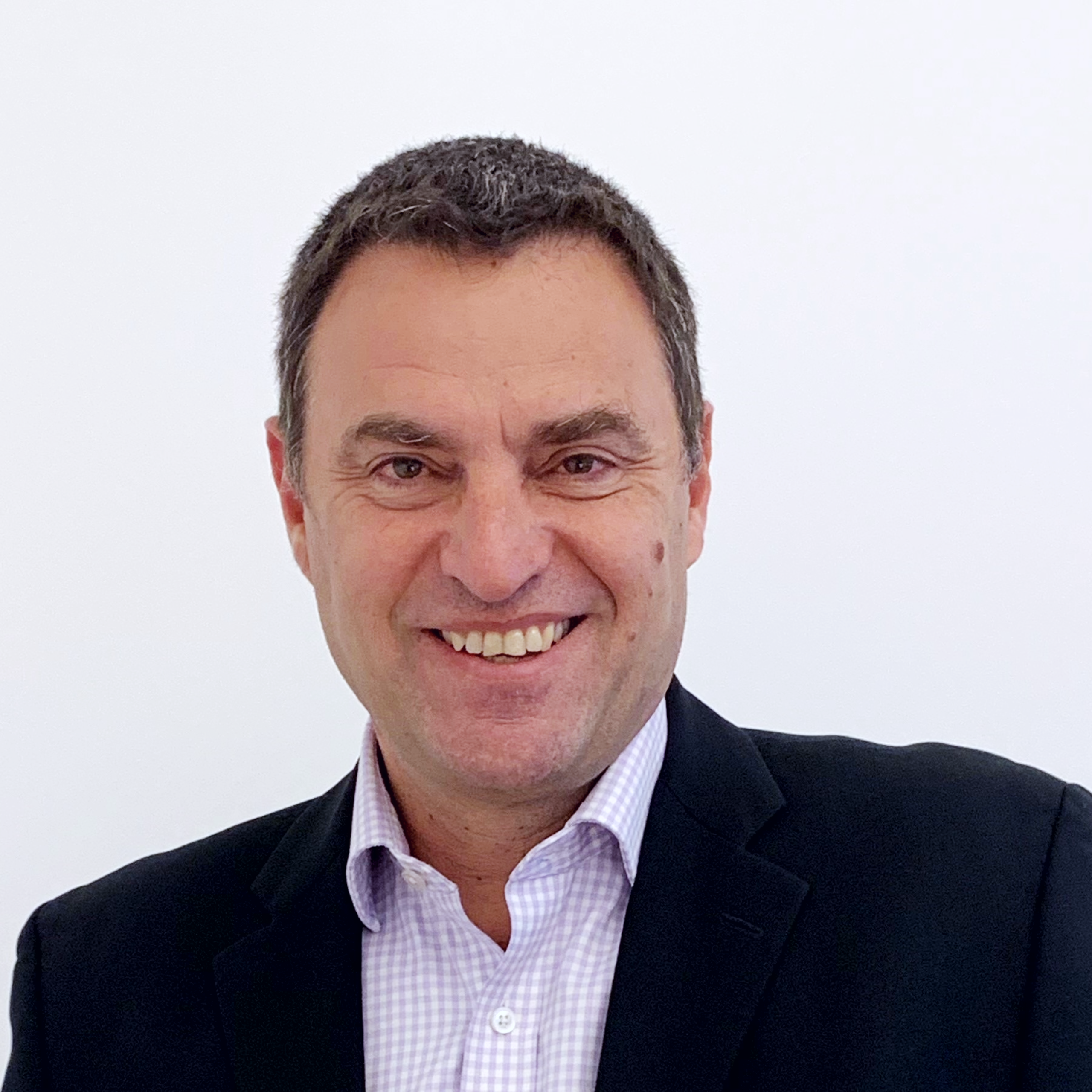 Headshot of Dave Mezher, CEO at HBSUK