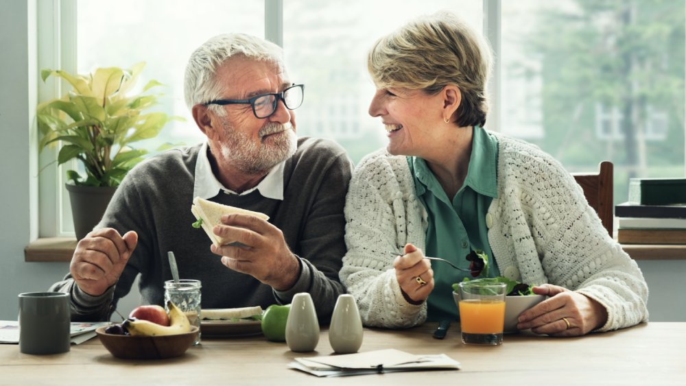 Retired couple eating their lunch