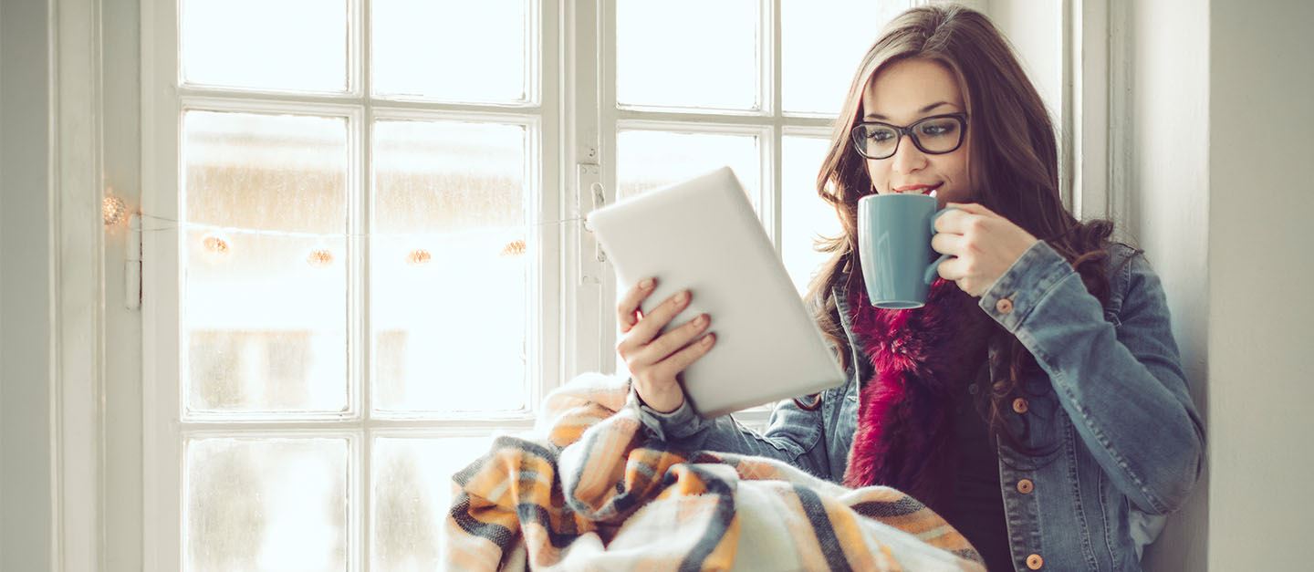 A person holding an iPad