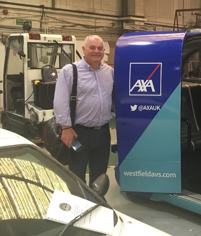 Doug Jenkins, AXA's Specialist Business Resilience Manager for Motor, with a driverless vehicle prototype