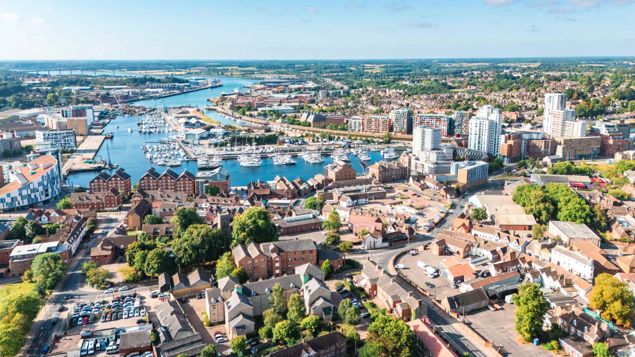 Aerial view of ipswich waterfront, suffolk, england, featuring the marina and cityscape on a sunny day