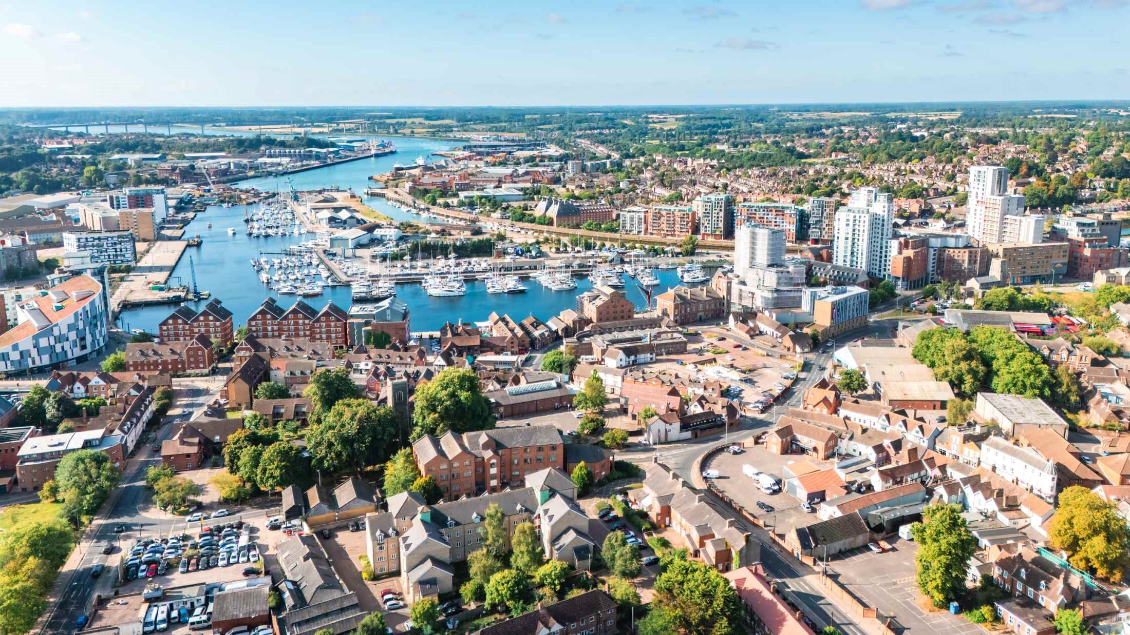 Aerial view of ipswich waterfront, suffolk, england, featuring the marina and cityscape on a sunny day