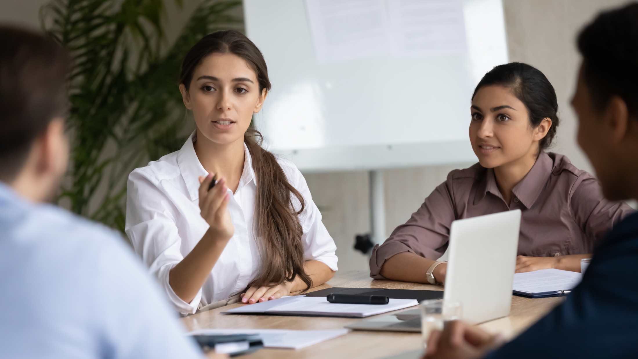 Businesswoman talking at meeting