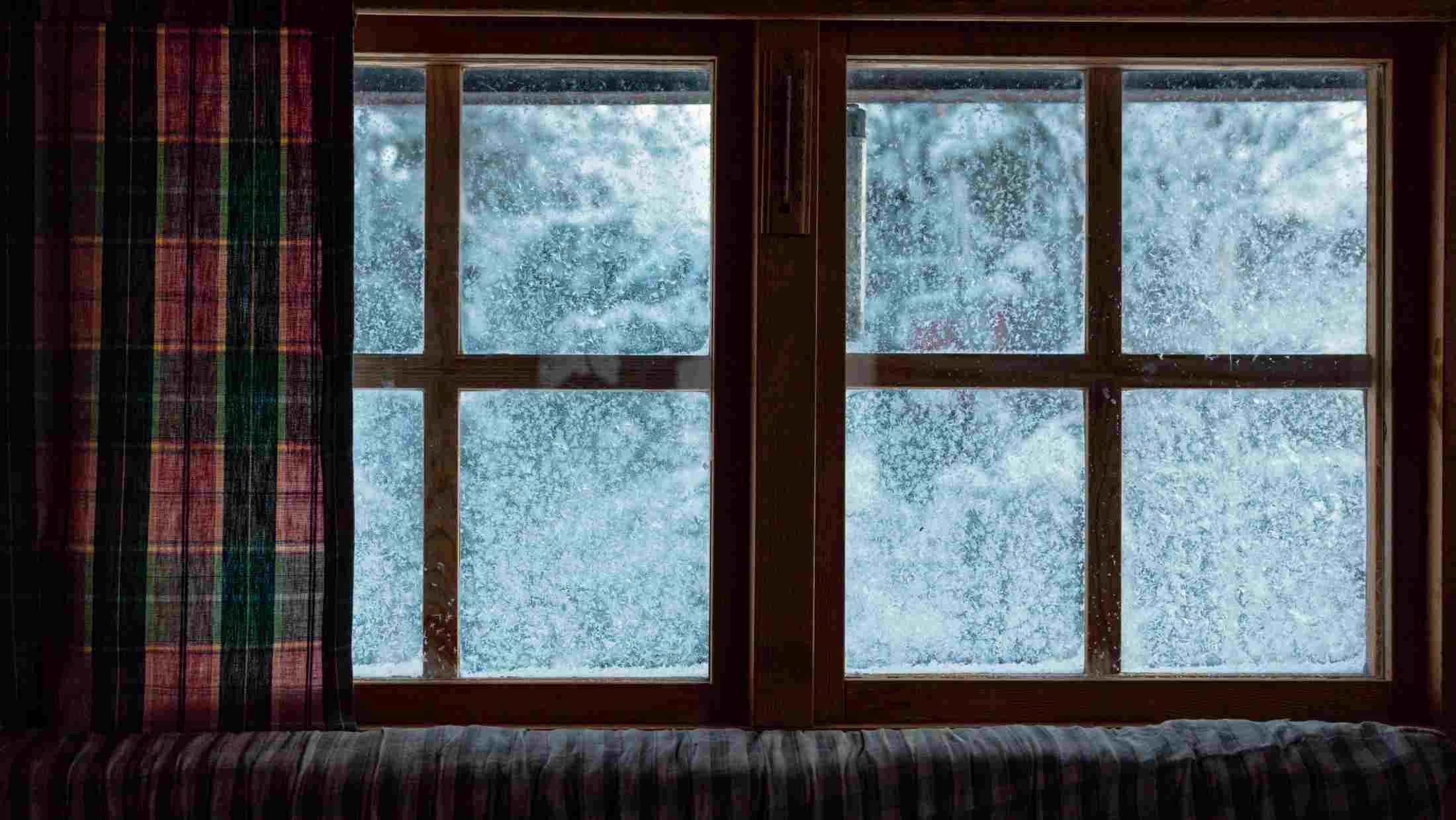 Closeup of frozen window at home