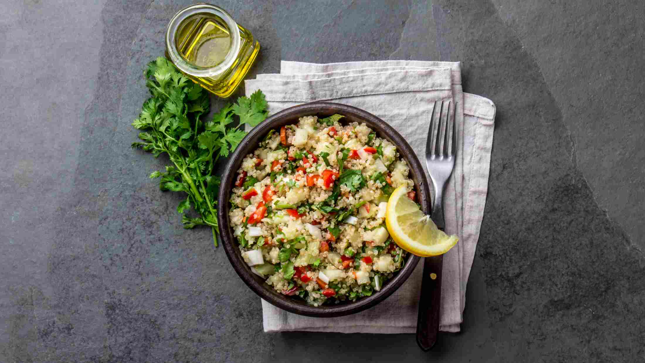 Traditional peruvian quinoa salad in clay bowl