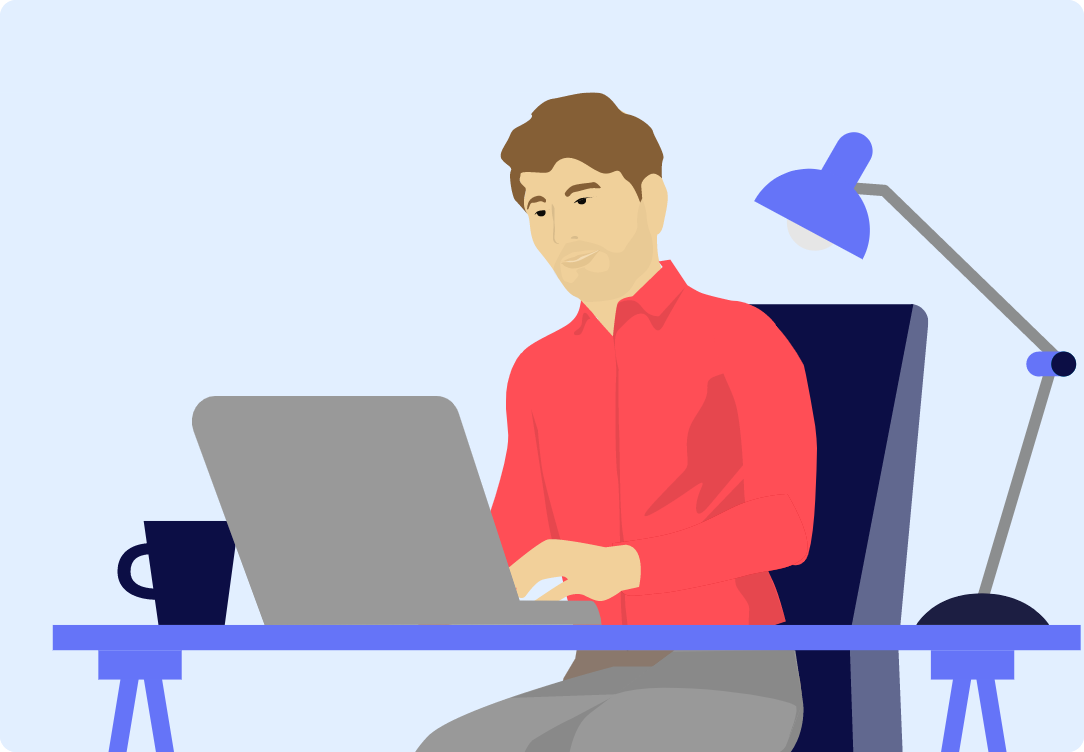 man-at-a-desk-working-on-his-laptop-computer