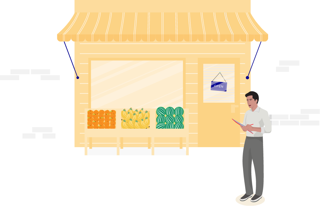 man standing in front of a shop
