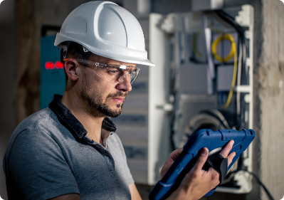 man-typing-on-a-keyboard-at-a-work-desk-computer