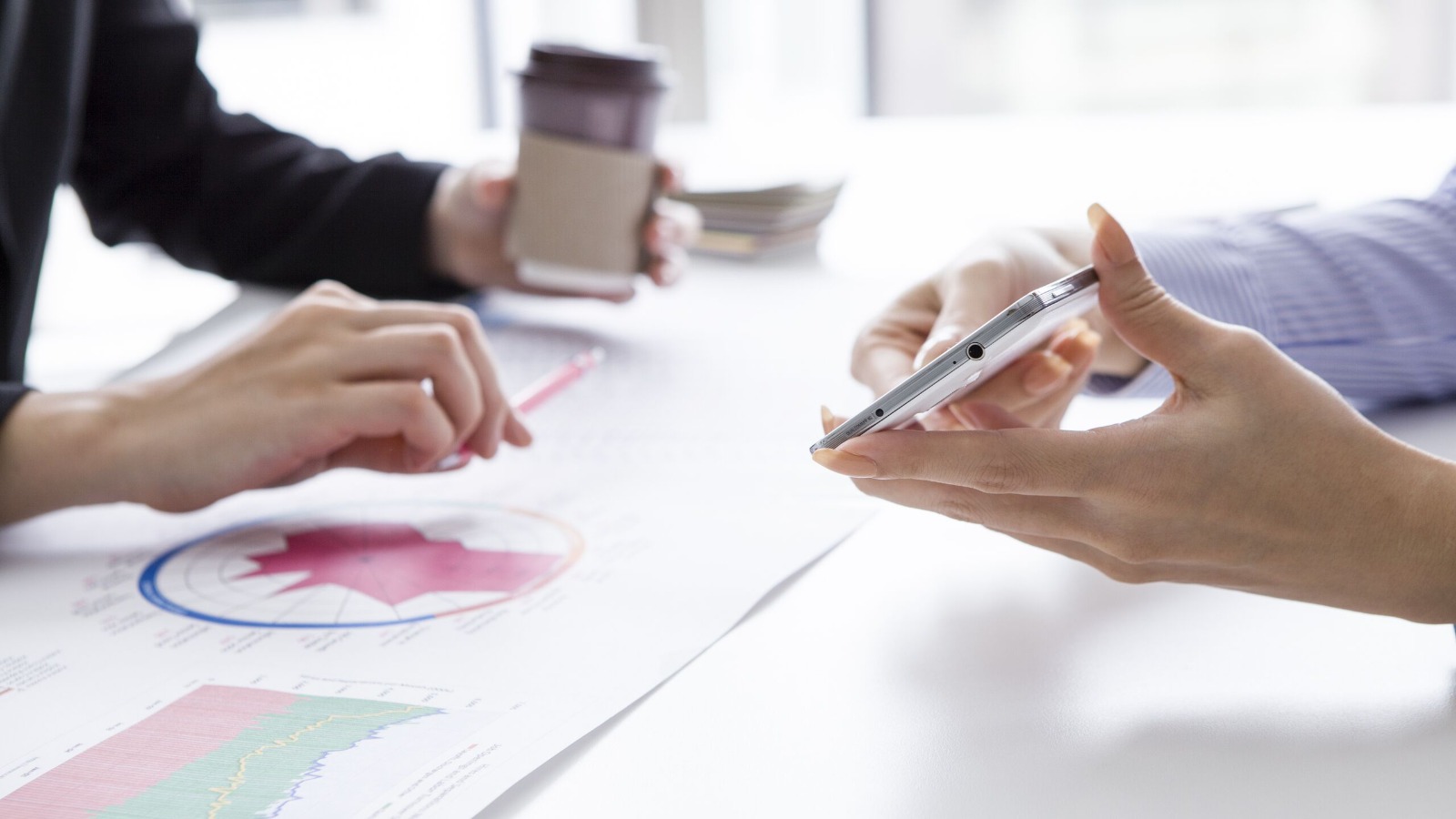 People analysing statistical report