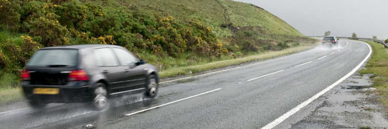 Cars driving in windy conditions