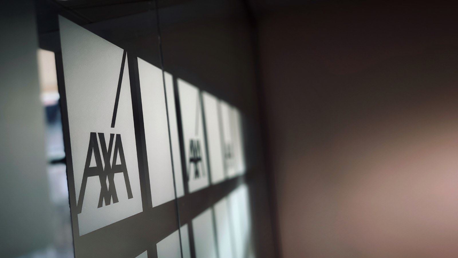 AXA logos etched on glass