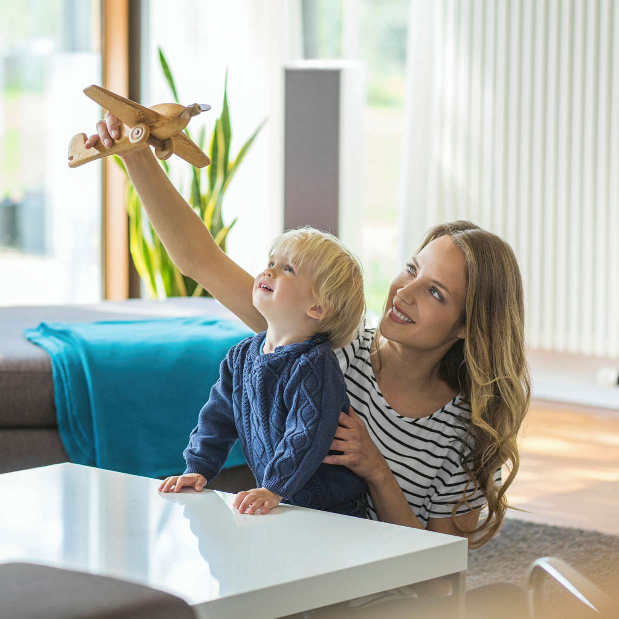 Mother and son playing at home