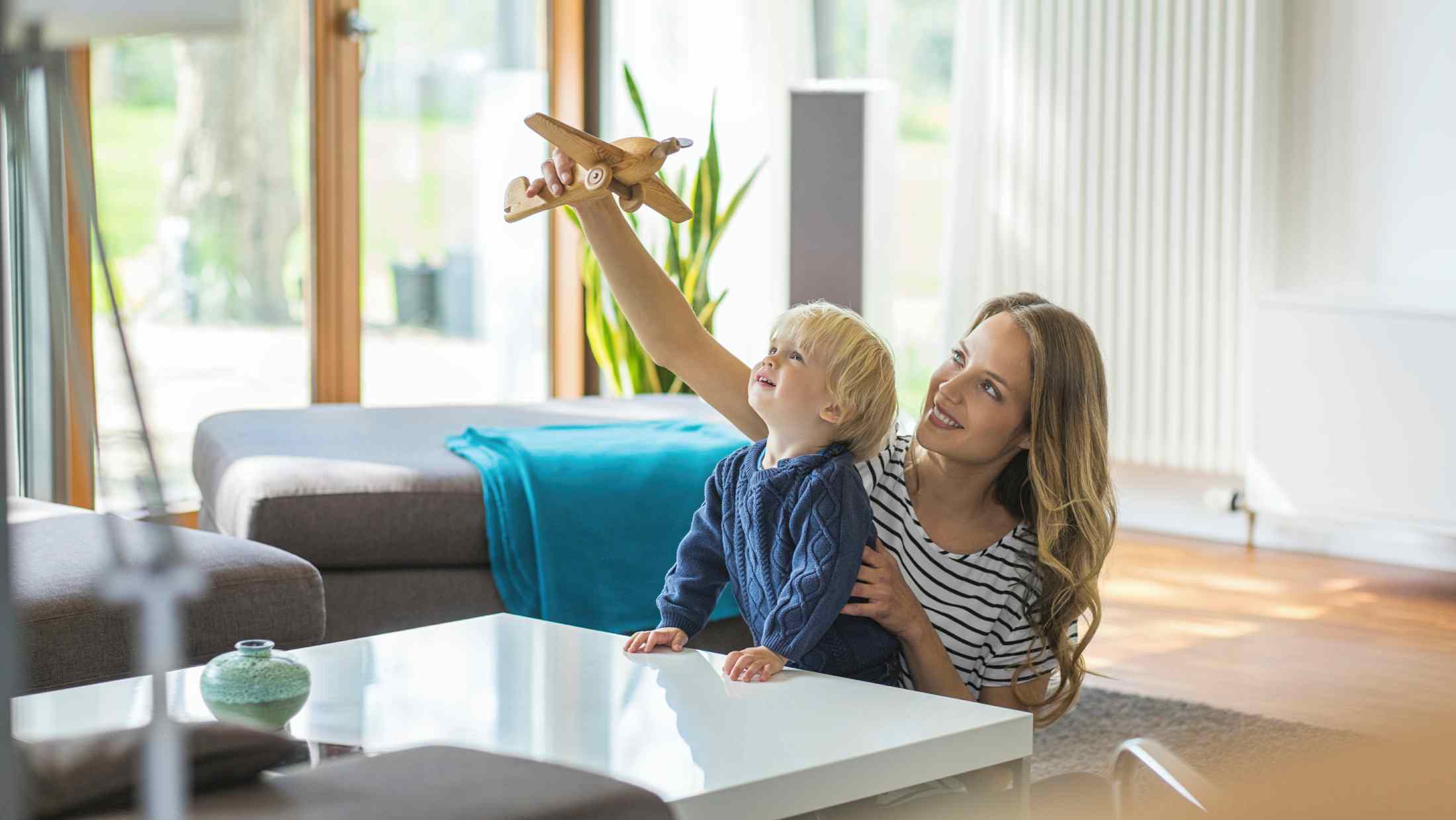 Mother and son playing at home