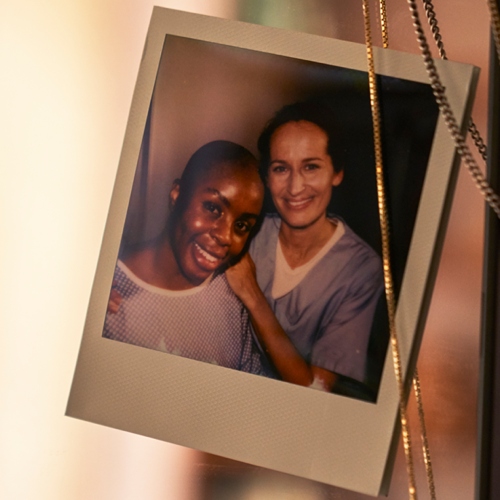 photo of a nurse and a patient attached on a mirror