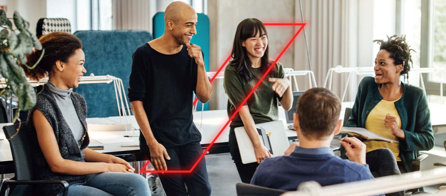 Happy multi-ethnic people in discussion at office