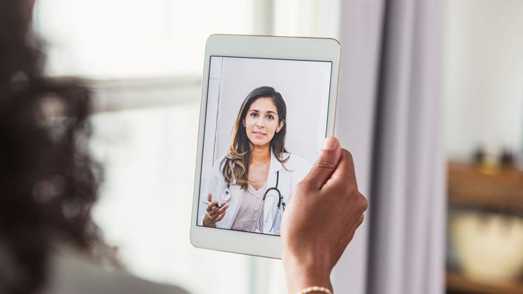 A female doctor during a telemedicine appointment