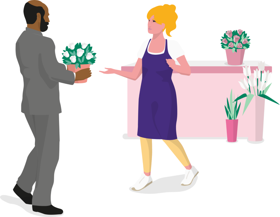 Man purchasing flowers from a florist
