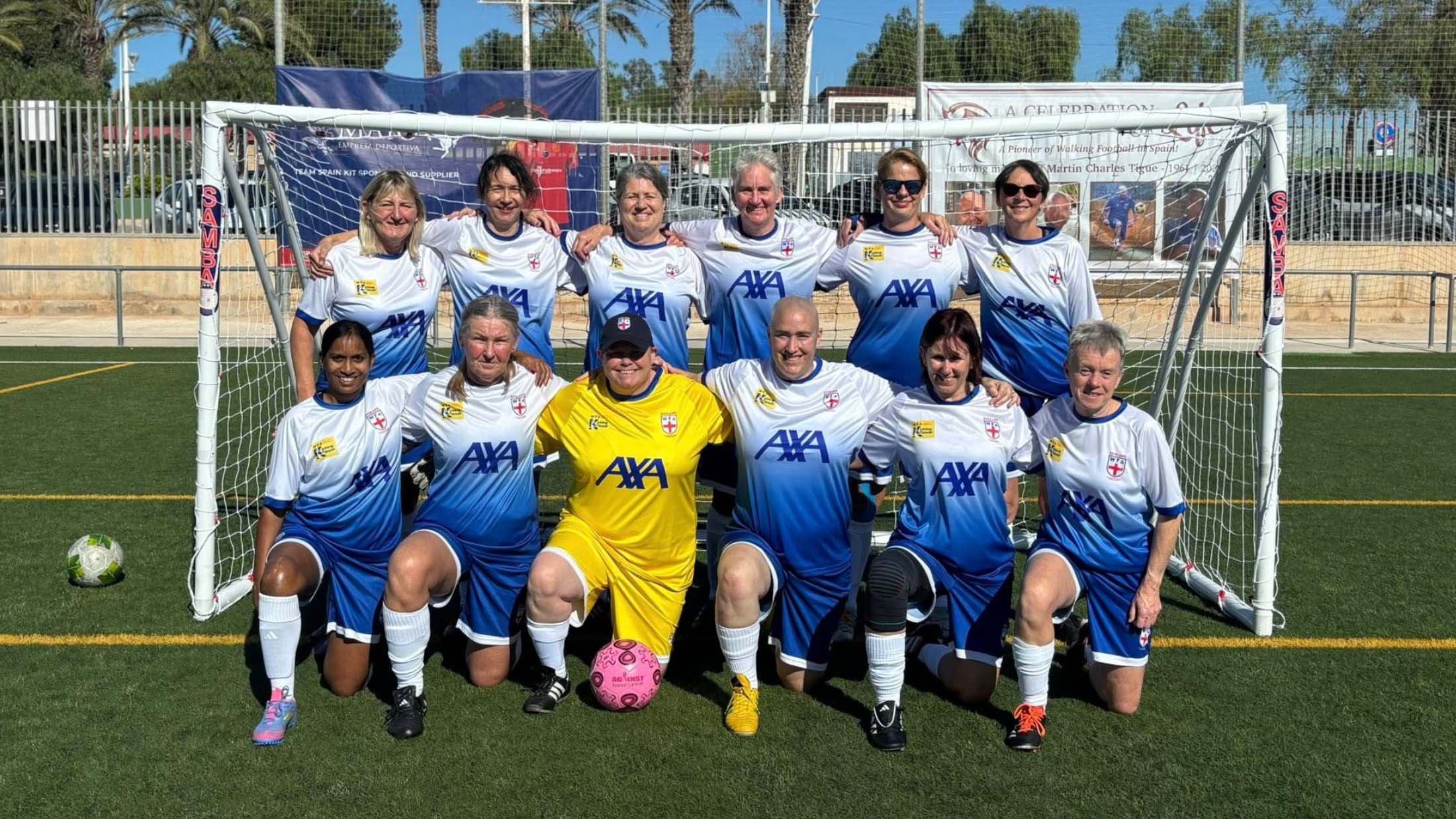 England Women's Walking Football Team wearing shirts sponsored by AXA