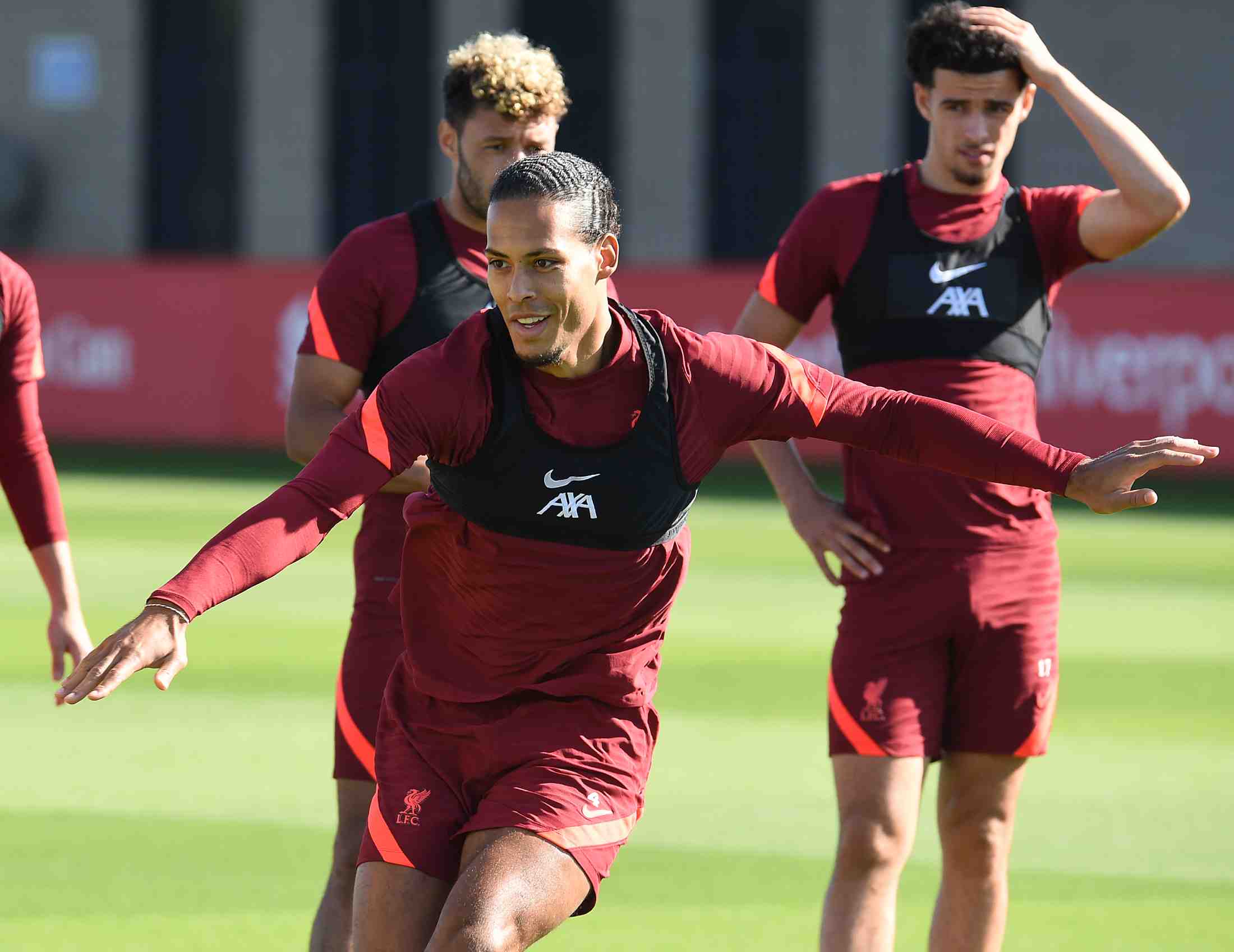 Liverpool Football Club players wearing their AXA sponsored training kit