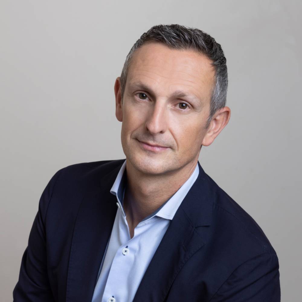 Headshot of Claudio Gienal, Chief Executive Officer, AXA UK and Ireland