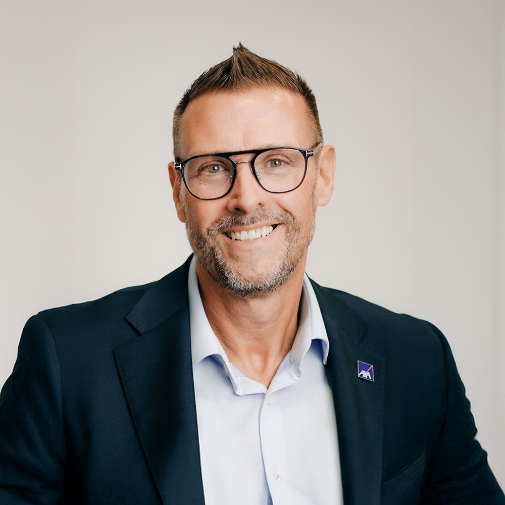 Headshot of Jon Walker, Chief Executive Officer, AXA Insurance