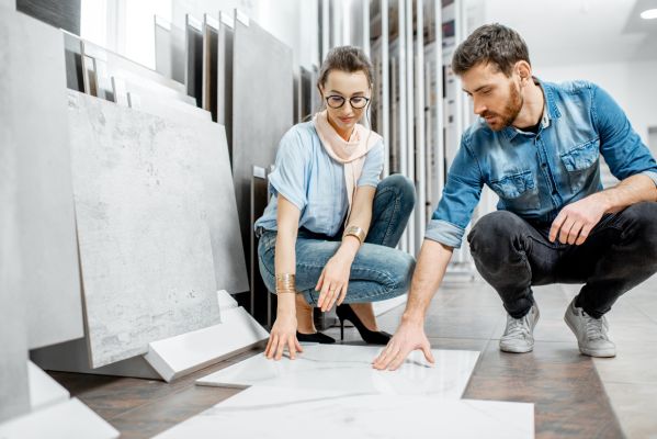 Couple choosing floor tiles