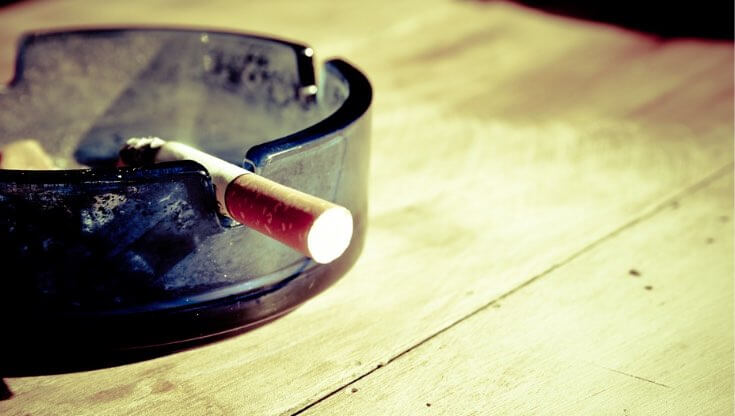 Cigarette in ashtray