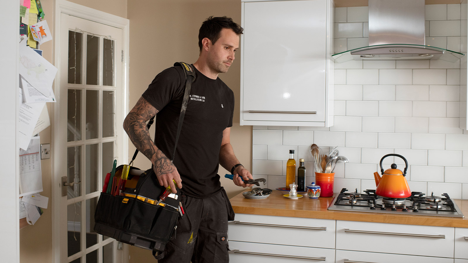 Chris the plumber arrives to fix a sink