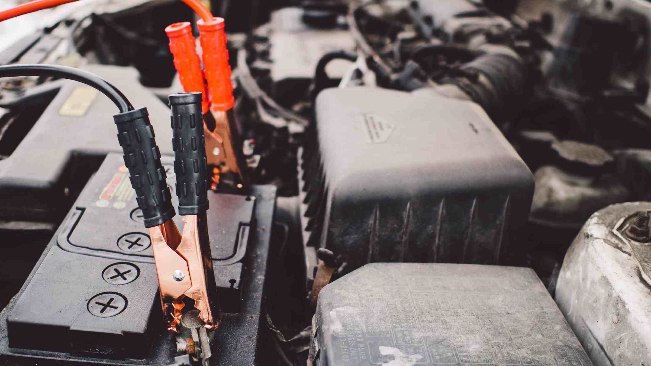 Jumper cables attached to an engine