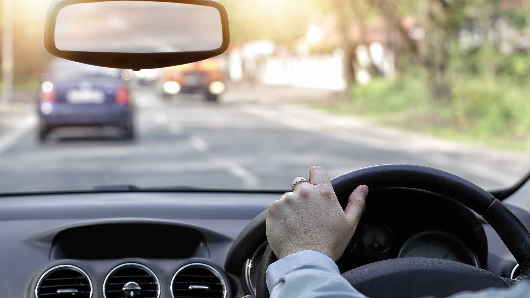 Close shot of driver on road