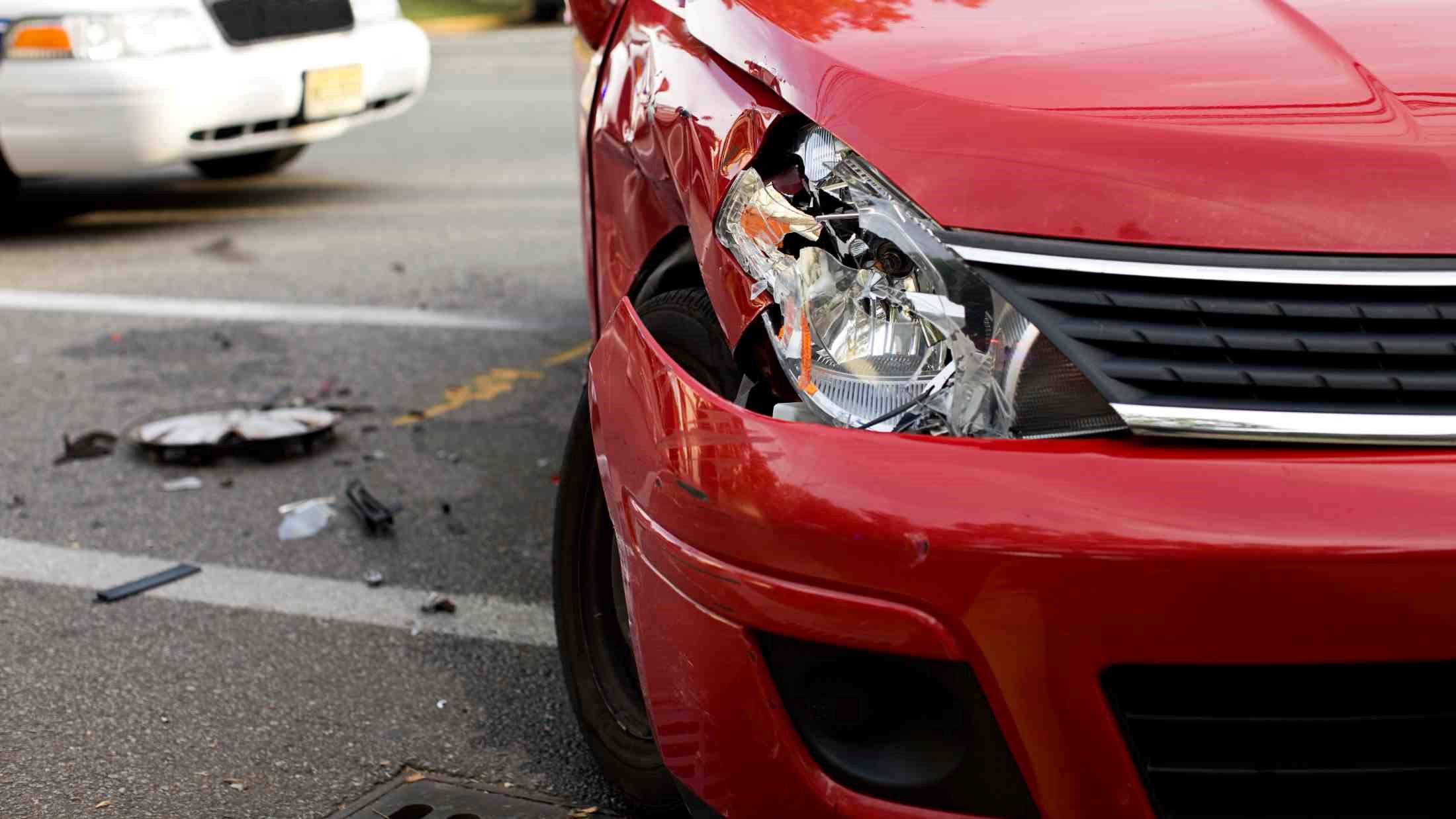 Damaged headlight after a car accident