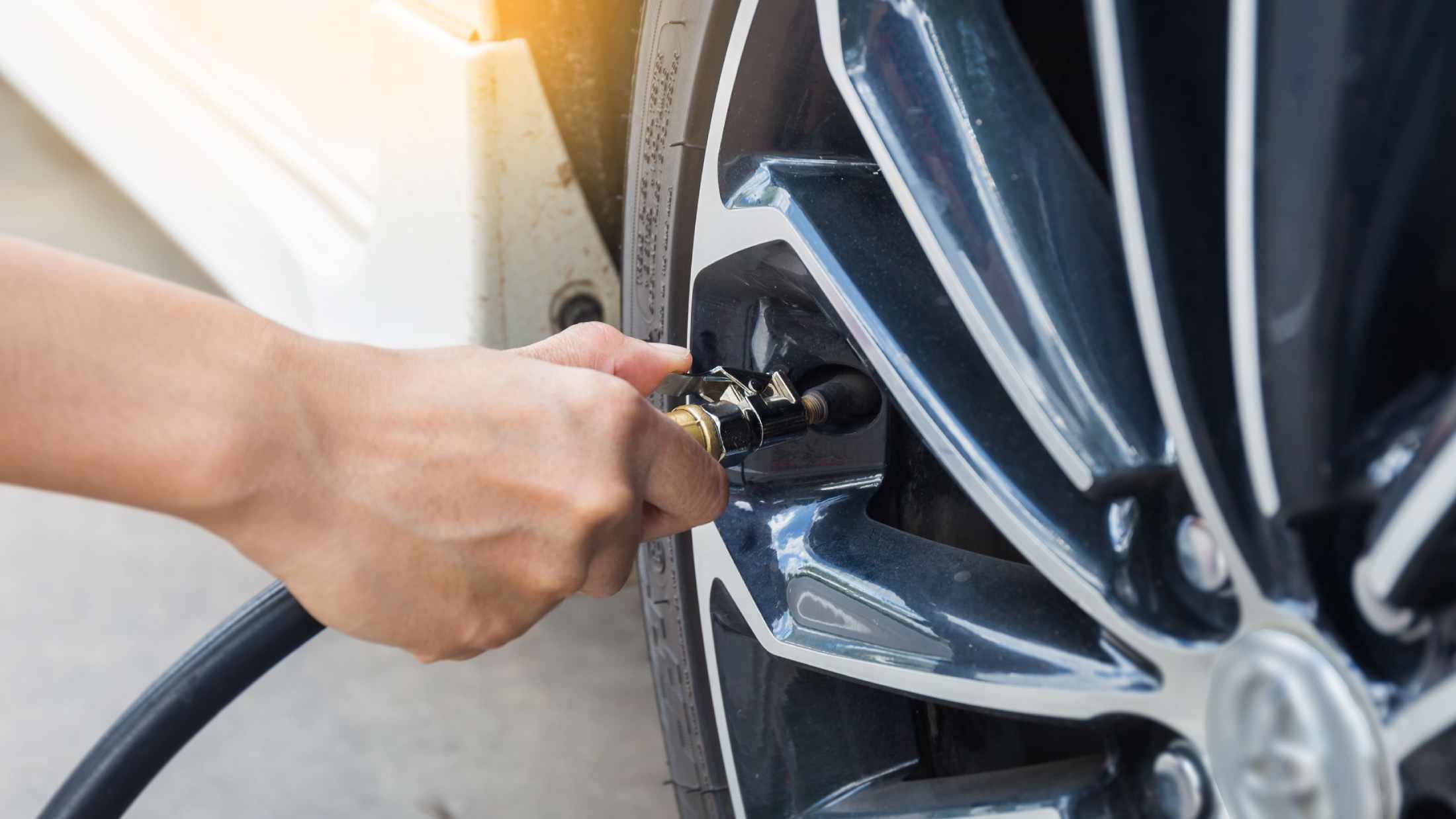 Inflating a car tyre