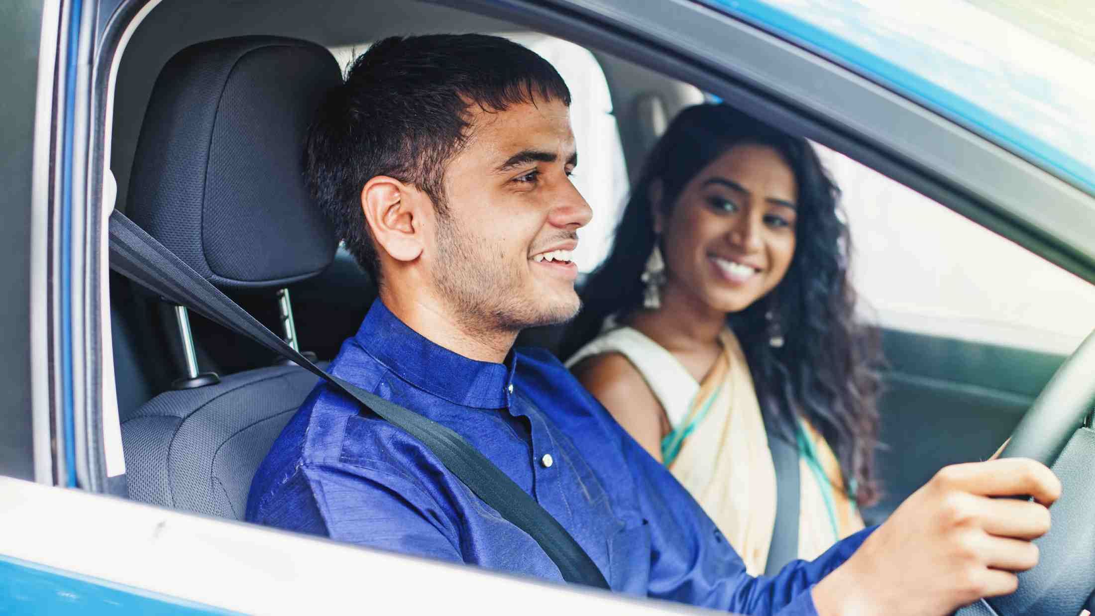 Young driver giving a lift to a friend