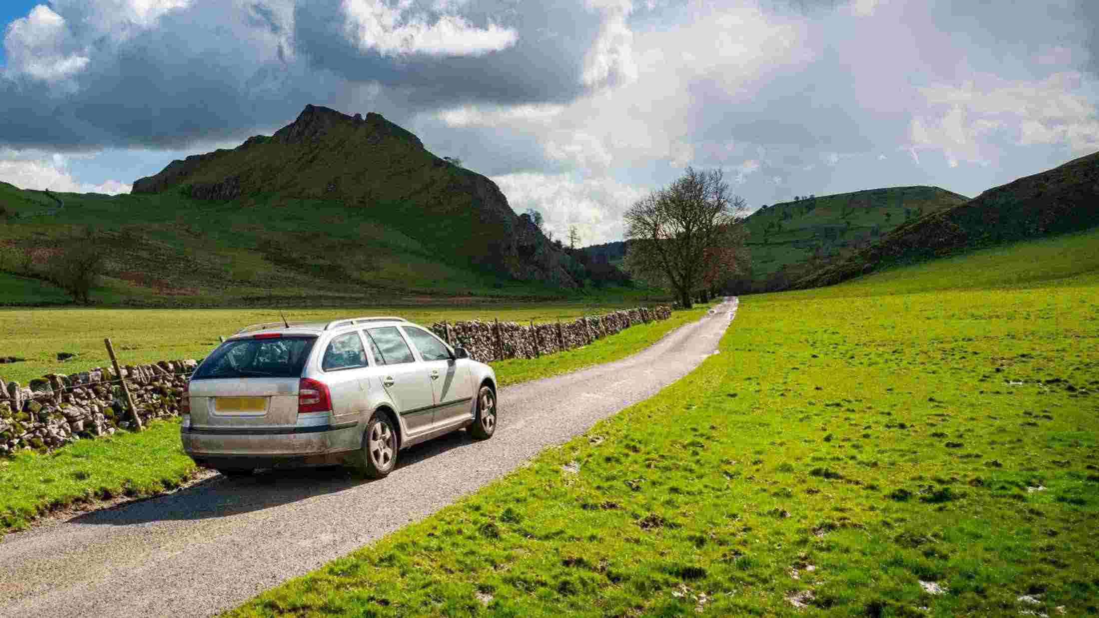 A car driving on a country road