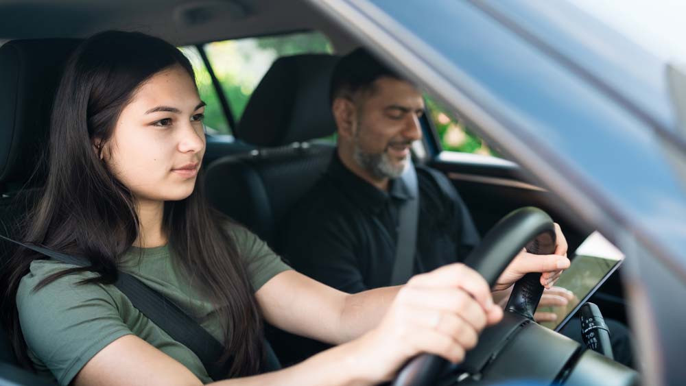 Young lady driving a car.jpg