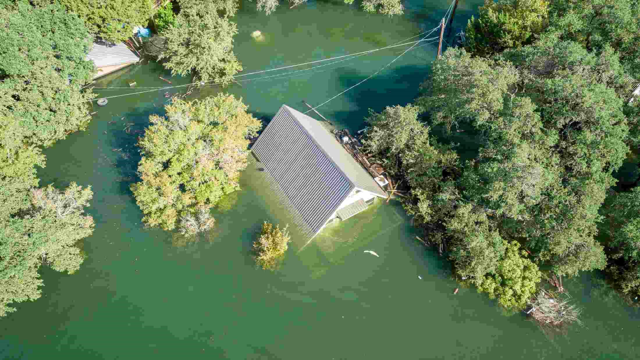 aerial drone view above a town flooding