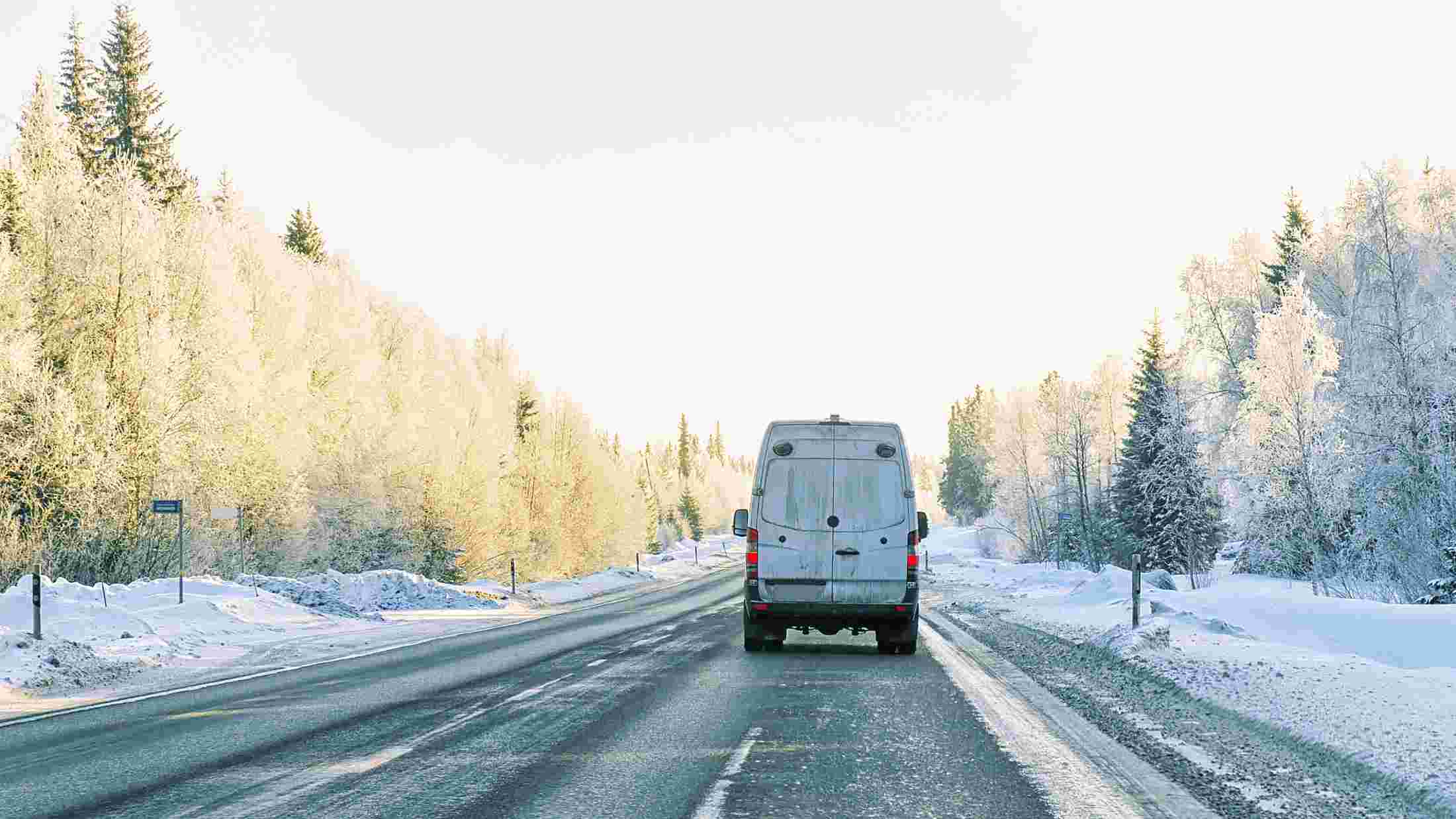 Minivan on the road during the winter