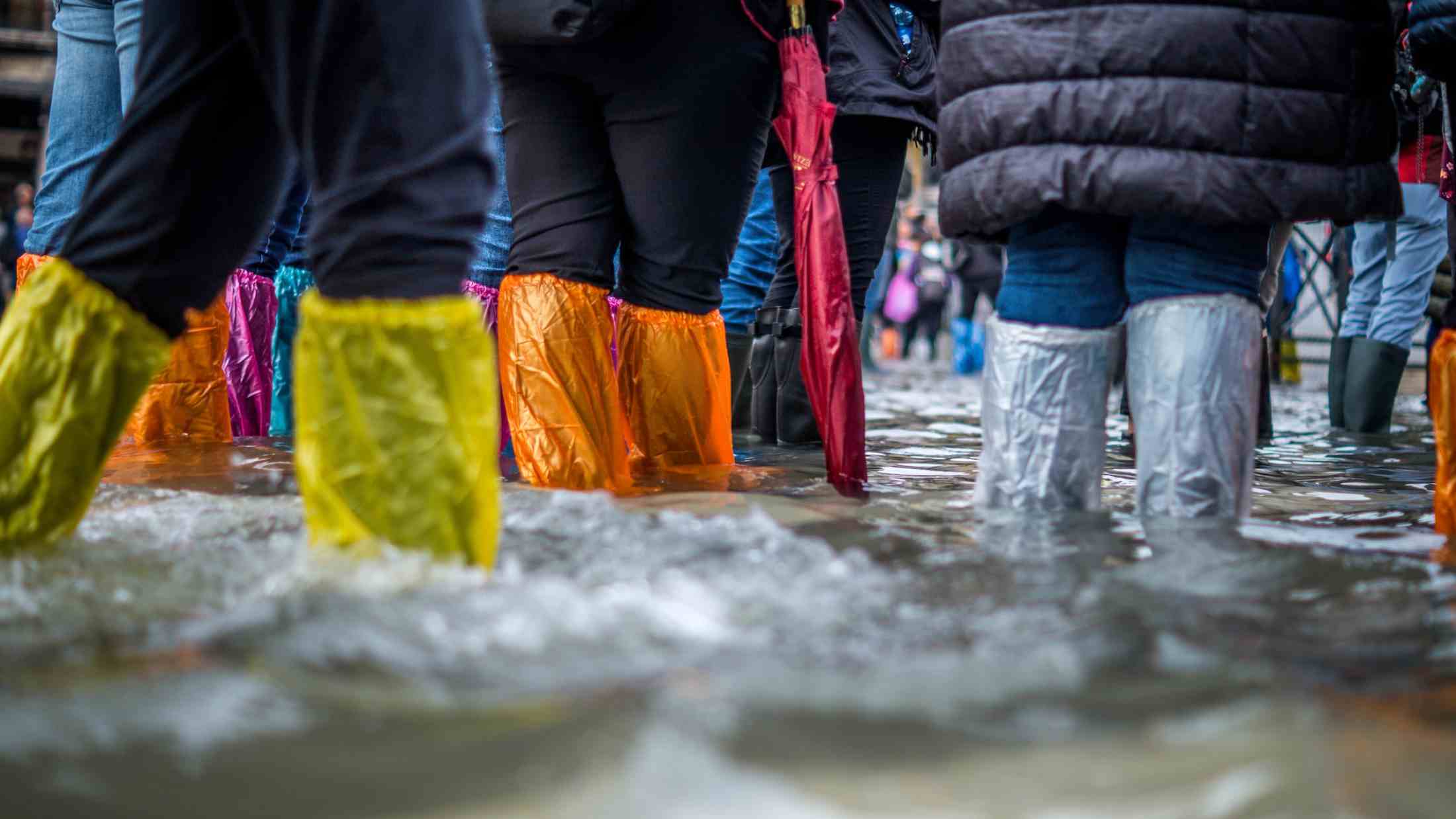 People stood in flood waters