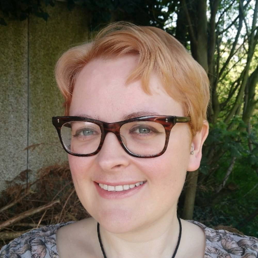 Headshot of Sarah Plumer, Senior Portflio Analyst and Chair of the Pride Network, AXA UK&I