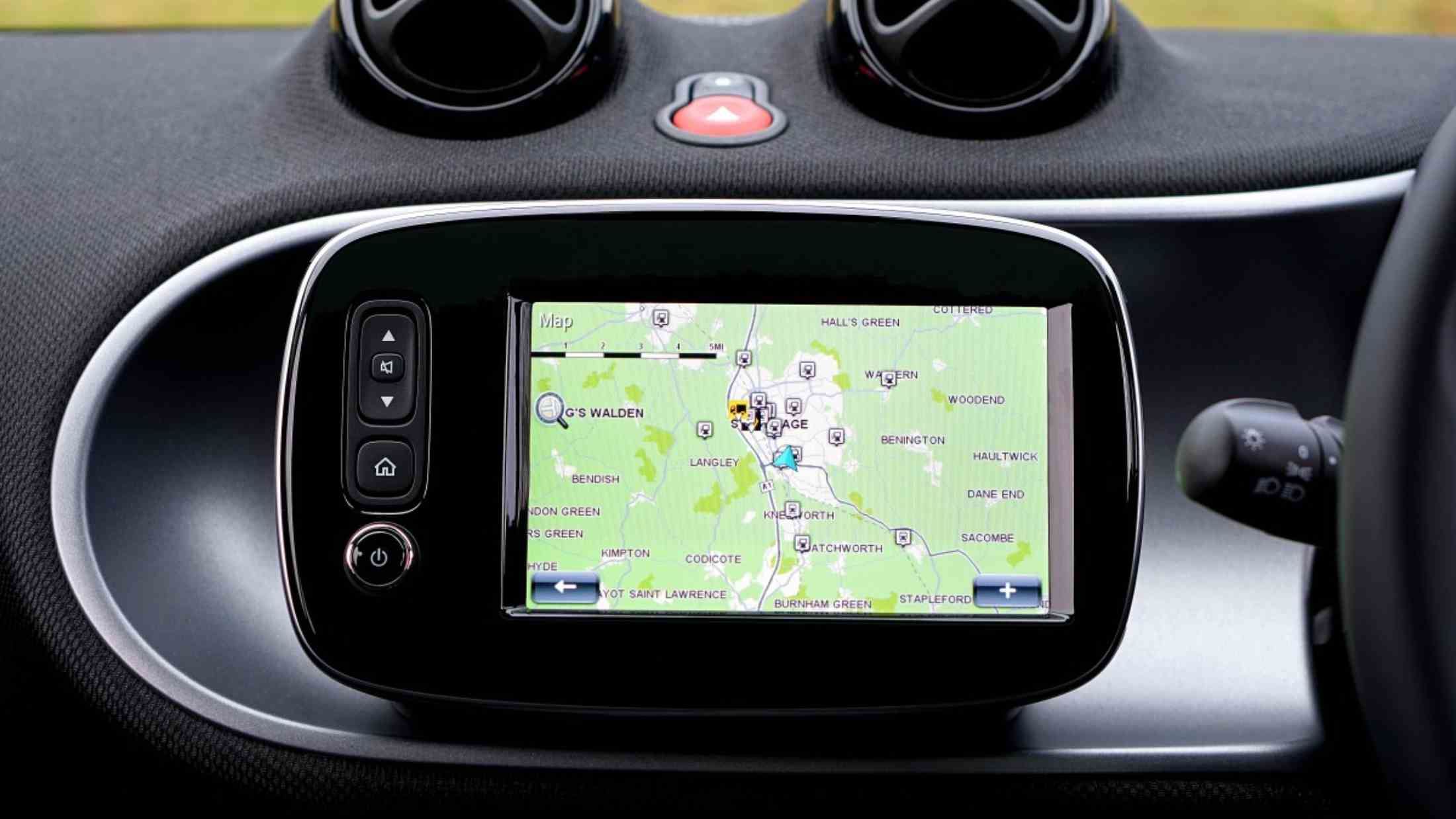 Sat Nav device fitted on car dasboard