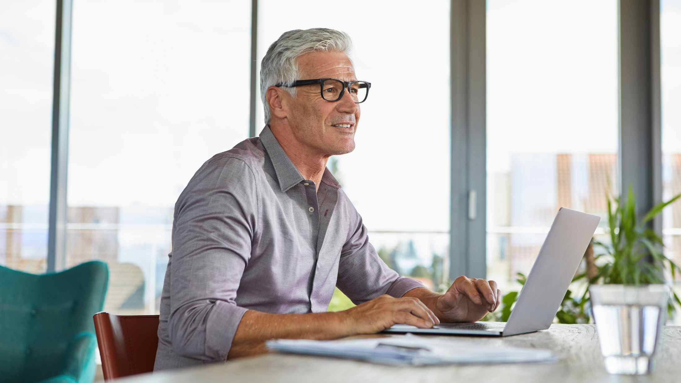 Senior man working at office