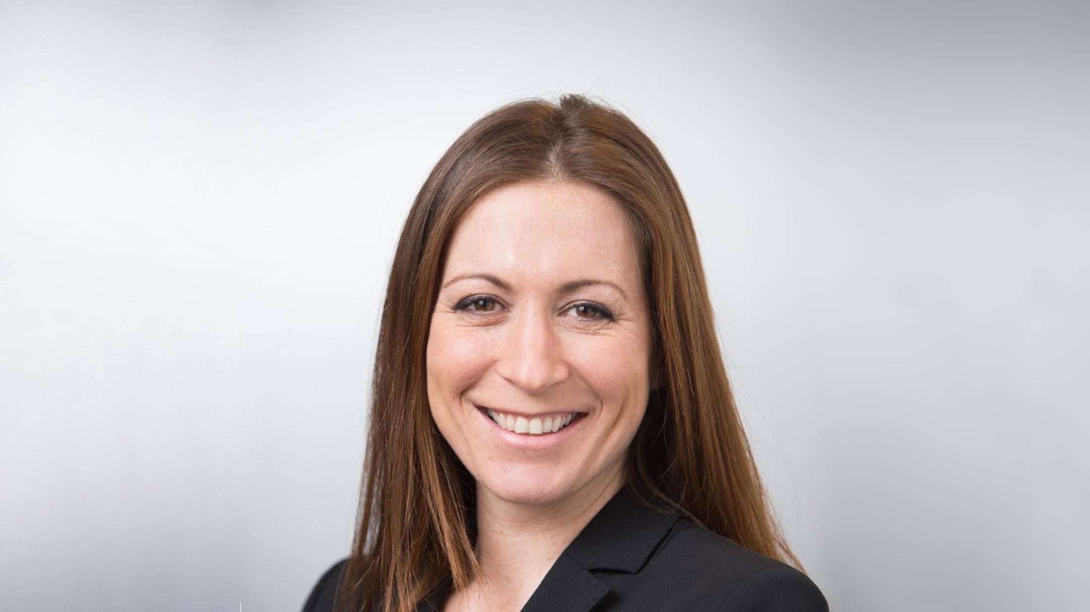 Headshot of Suzy Tiffany, AXA Retail Claims Director
