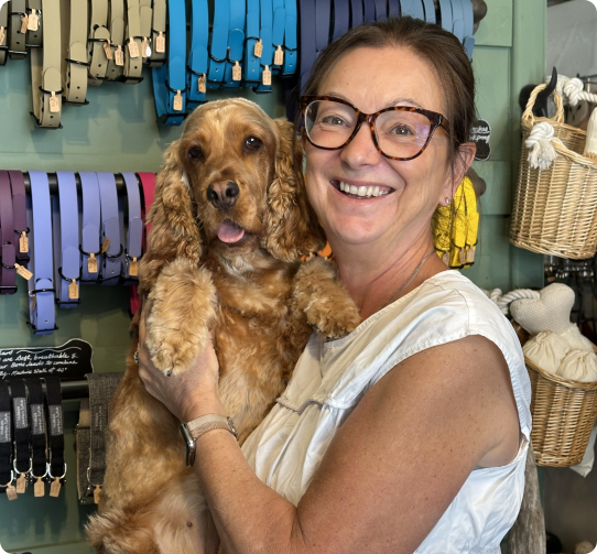 Woman holding small dog